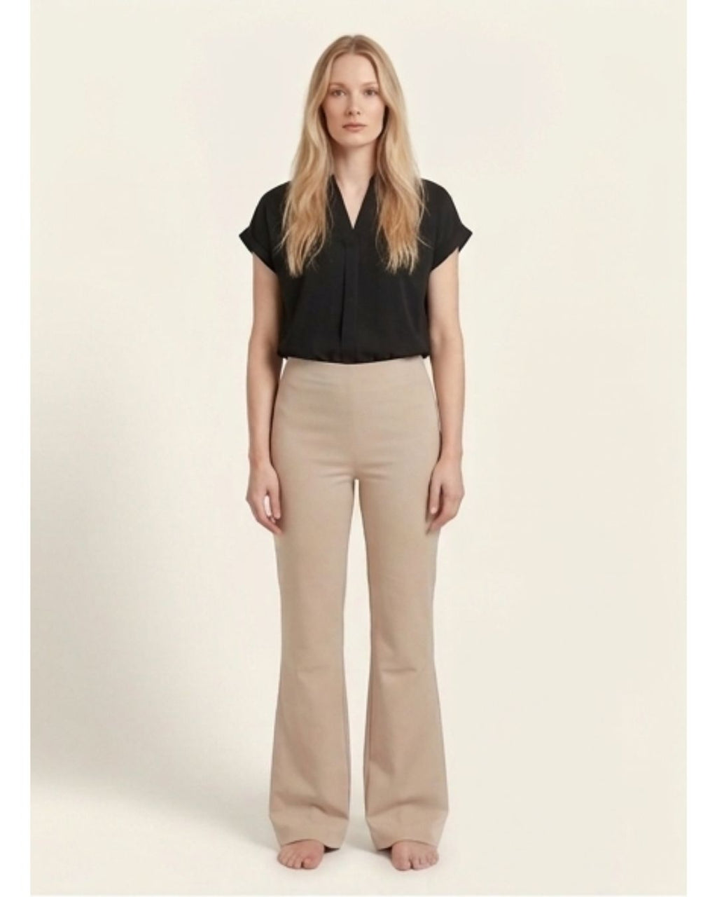 Beige bootleg trousers