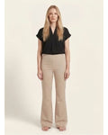 Beige bootleg trousers