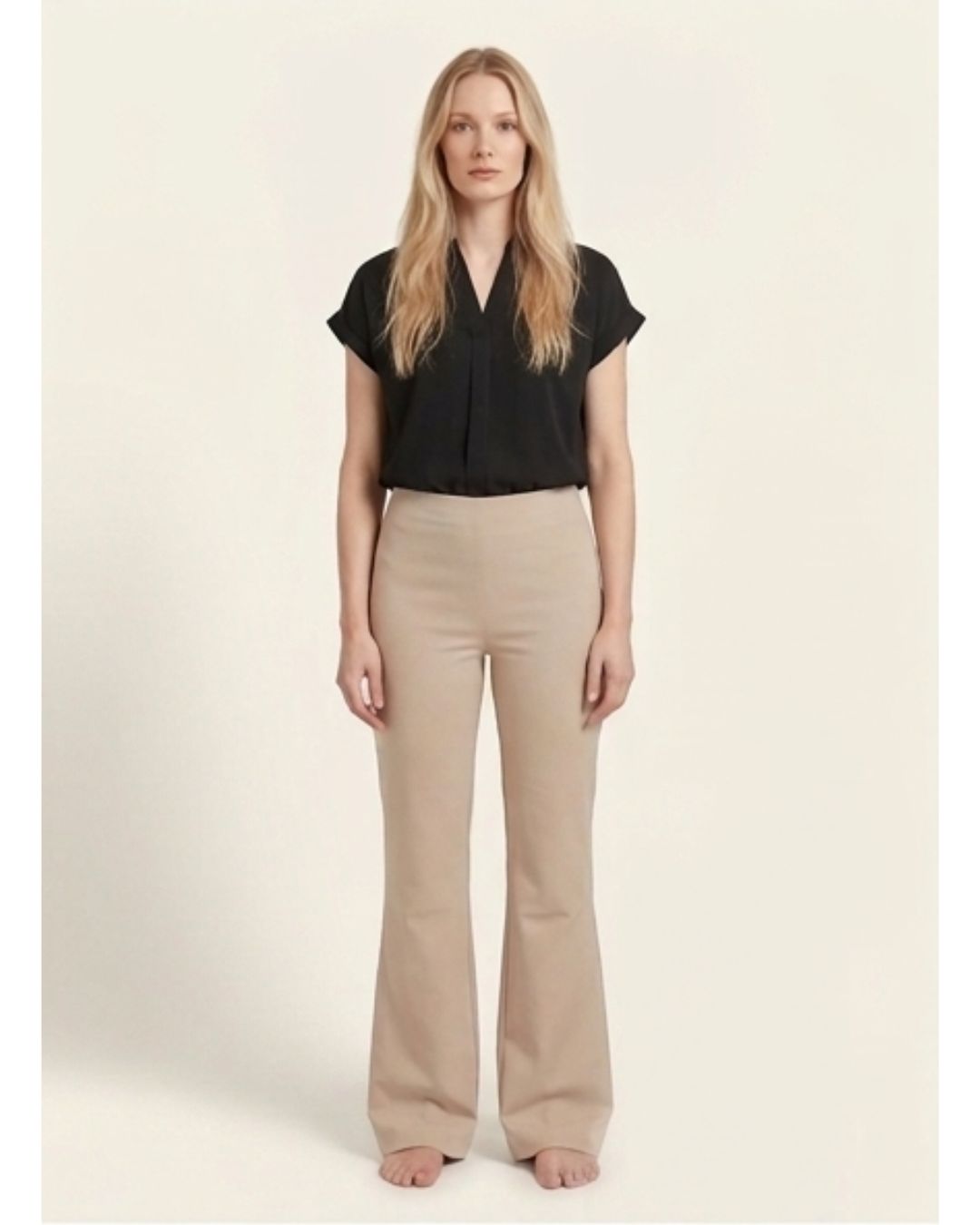 Beige bootleg trousers