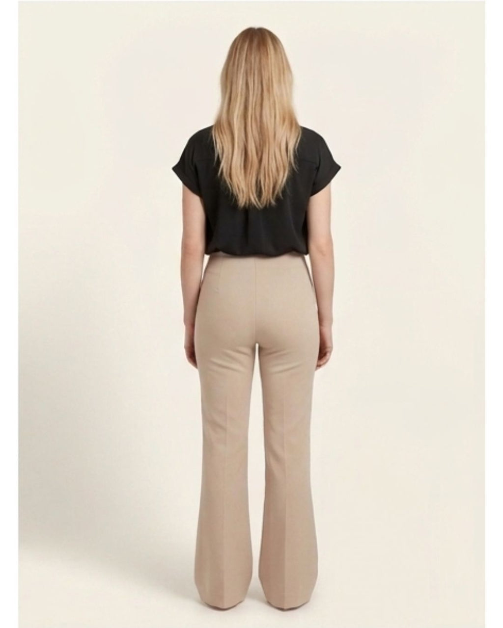 Beige bootleg trousers