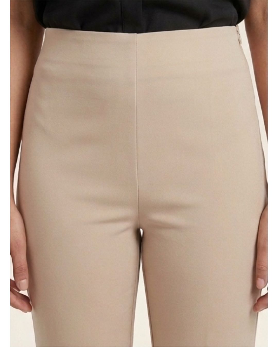 Beige bootleg trousers