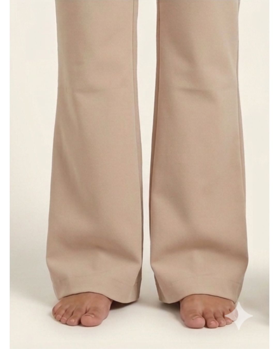 Beige bootleg trousers