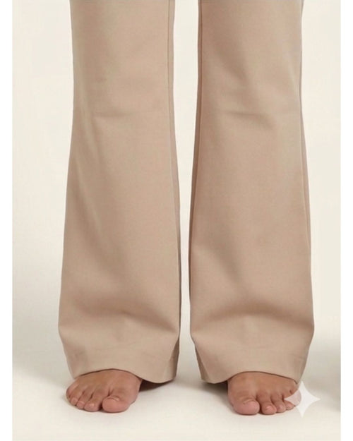 Beige bootleg trousers